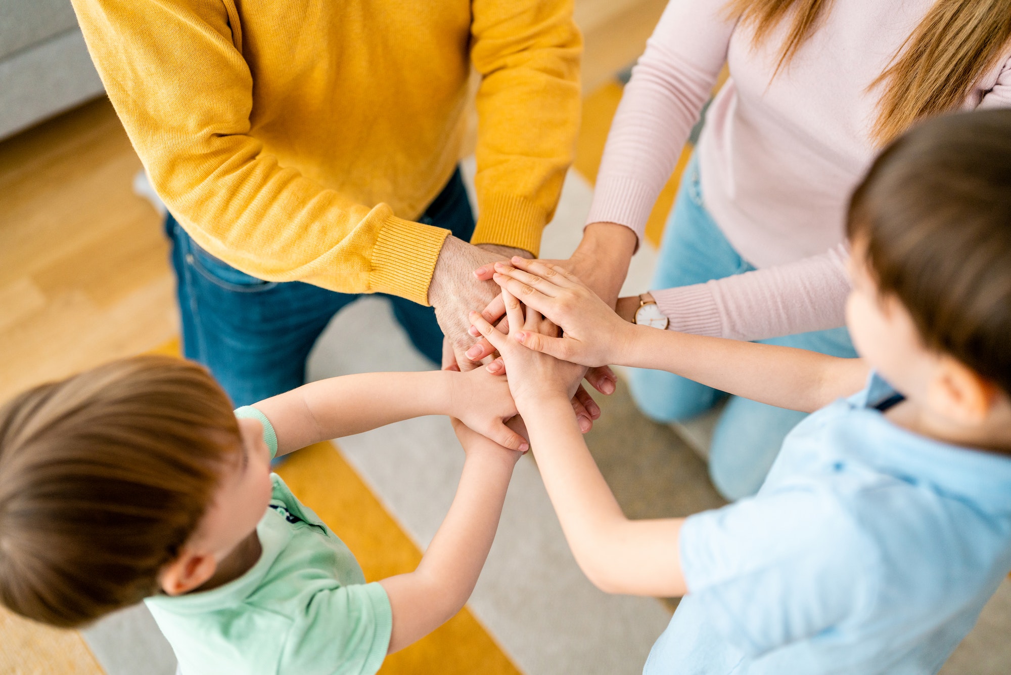 Hands of family together, unity, trust and peace concept